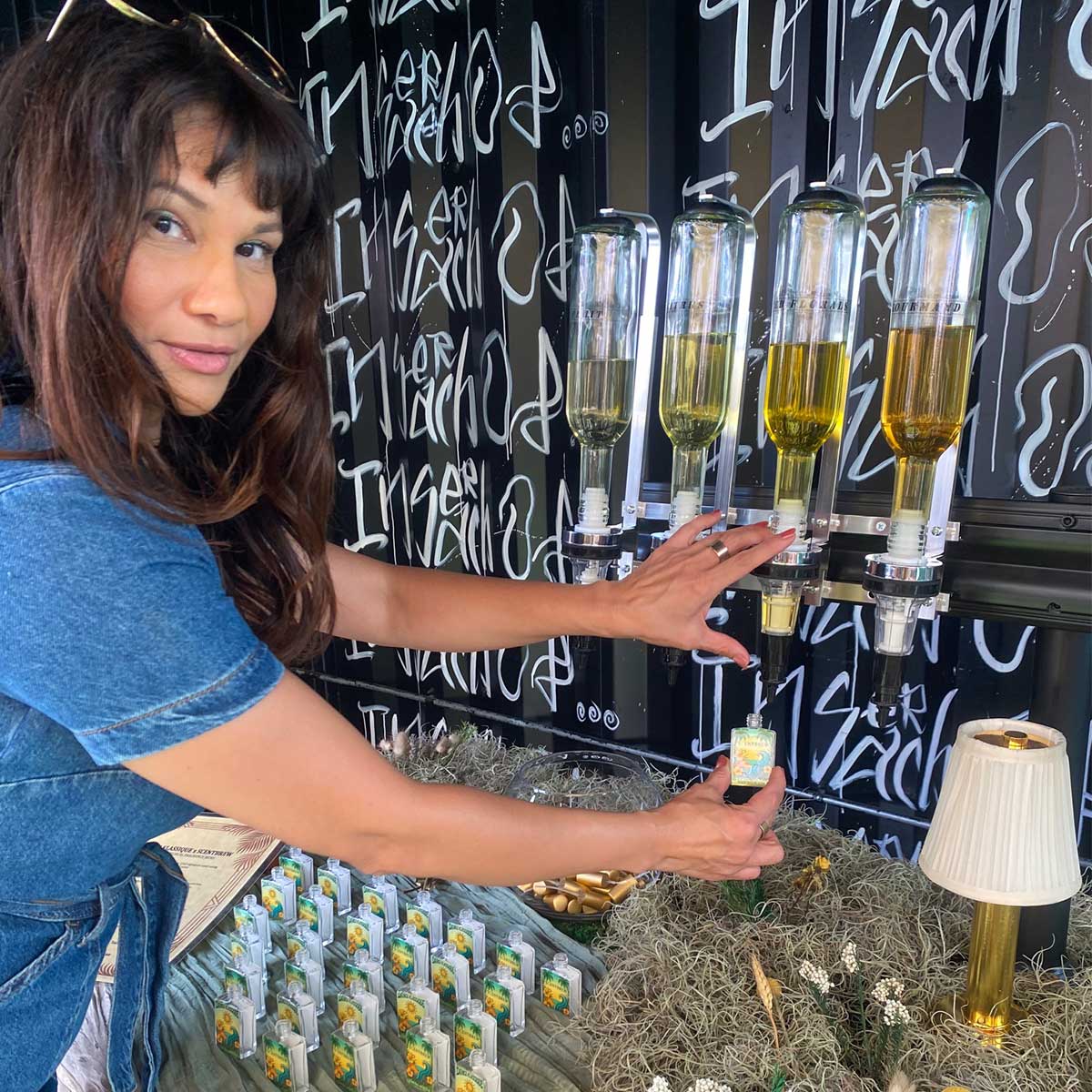 Portrait of Scent Brew founder Angel Lacy at the fragrance bar